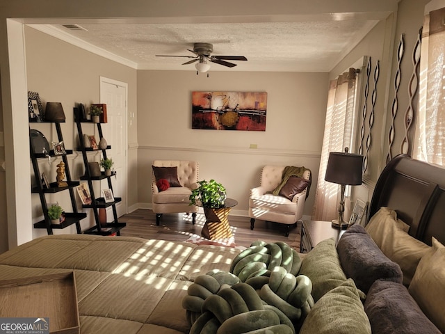 1625 Conley Rd Unit 229, Conley, GA 30288 - living area with wood finished floors, ceiling fan, a textured ceiling, and crown molding
