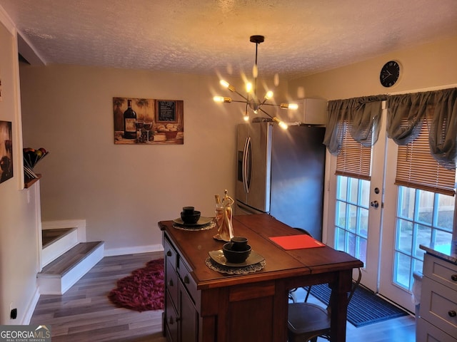 1625 Conley Rd Unit 229, Conley, GA 30288 - office area featuring a chandelier, dark wood-style flooring, a textured ceiling, and french doors