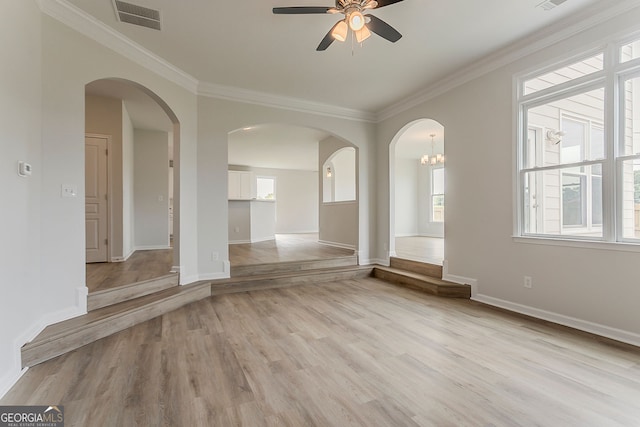70 Trinity Ln, Covington, GA 30016 - unfurnished room featuring ceiling fan, crown molding, and light wood-style flooring