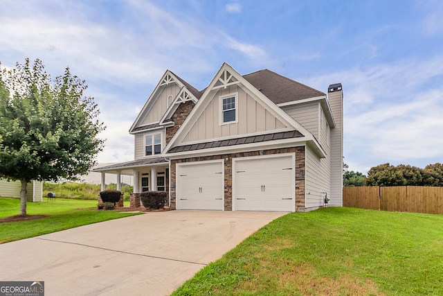 70 Trinity Ln, Covington, GA 30016 - craftsman-style house with a standing seam roof, driveway, a garage, board and batten siding, and a chimney