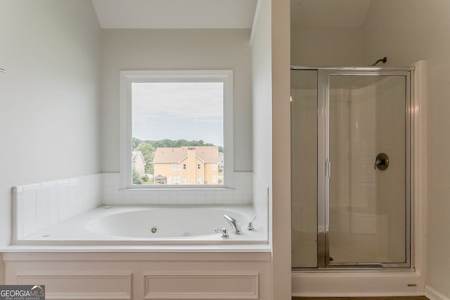 70 Trinity Ln, Covington, GA 30016 - bathroom featuring a shower stall and a whirlpool tub