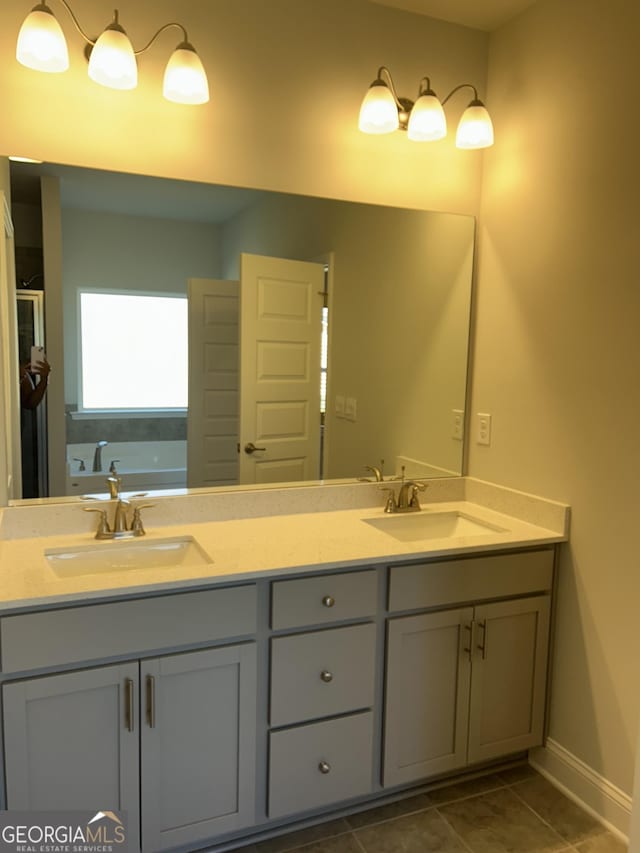 1179 Barrington Place Way, Macon, GA 31220 - full bathroom featuring double vanity, a garden tub, and tile patterned flooring