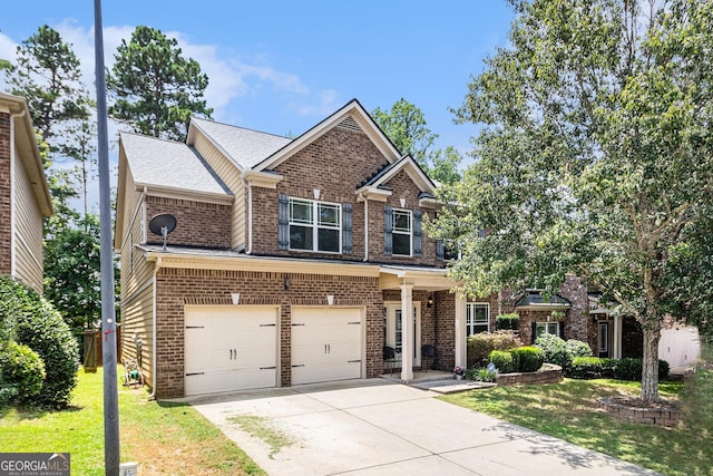 94 Torero Trl, Newnan, GA 30263 - craftsman-style house featuring brick siding, a garage, a front yard, and concrete driveway