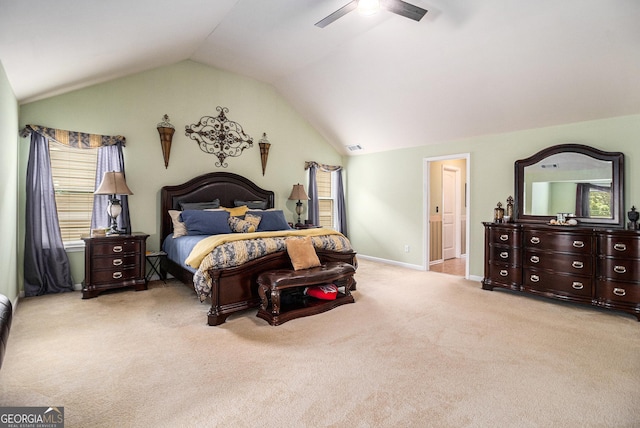 94 Torero Trl, Newnan, GA 30263 - carpeted bedroom featuring lofted ceiling, multiple windows, and a ceiling fan