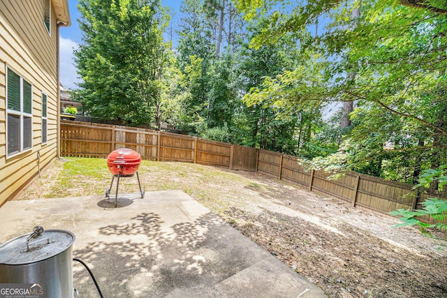 94 Torero Trl, Newnan, GA 30263 - fenced backyard featuring a patio