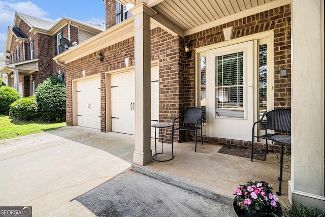 94 Torero Trl, Newnan, GA 30263 - view of patio featuring concrete driveway and an attached garage