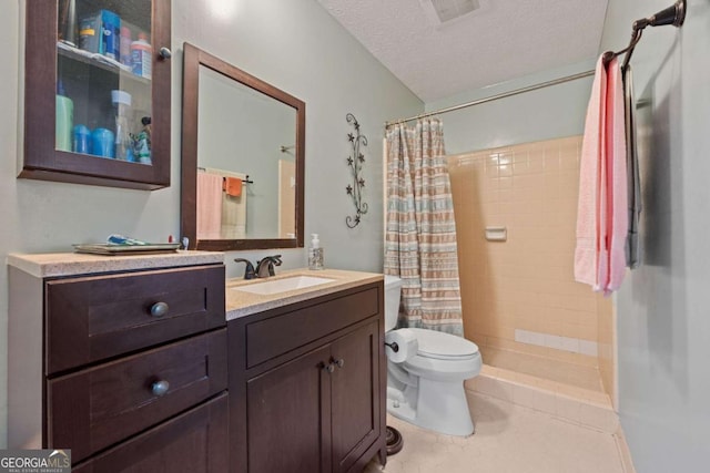 1809 Claron Ave, Conley, GA 30288 - full bath with vanity, a tile shower, a textured ceiling, and tile patterned floors