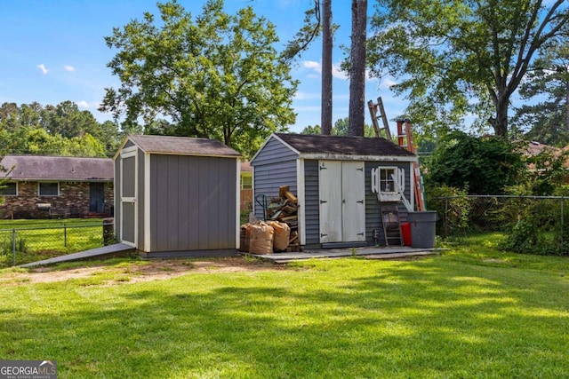 1809 Claron Ave, Conley, GA 30288 - view of shed with a fenced backyard