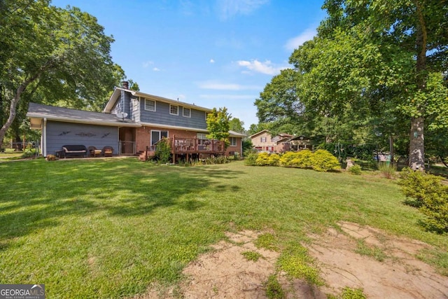 1809 Claron Ave, Conley, GA 30288 - view of green lawn featuring a wooden deck