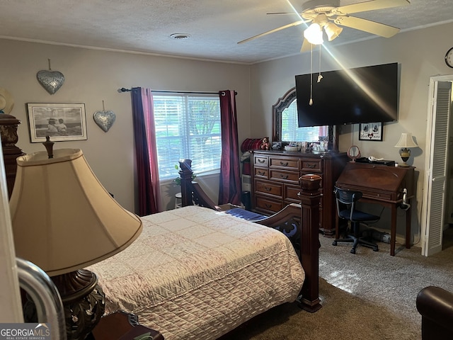 2203 Honeybee Creek Dr, Griffin, GA 30224 - carpeted bedroom featuring ornamental molding, ceiling fan, and a textured ceiling
