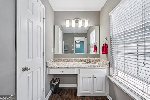 545 Windstone Trl, Alpharetta, GA 30004 - bathroom featuring wood finished floors and vanity
