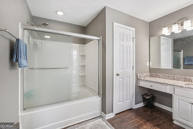 545 Windstone Trl, Alpharetta, GA 30004 - full bath featuring combined bath / shower with glass door, vanity, and wood finished floors