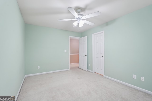 545 Windstone Trl, Alpharetta, GA 30004 - unfurnished bedroom featuring carpet flooring and a ceiling fan