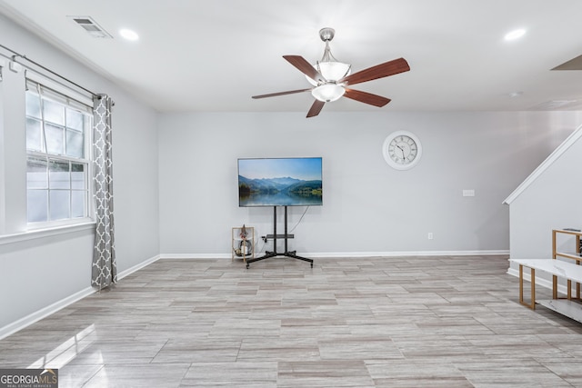 545 Windstone Trl, Alpharetta, GA 30004 - unfurnished living room featuring ceiling fan, recessed lighting, and light wood-type flooring