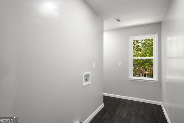 1783 Cheyenne Trl, Jonesboro, GA 30236 - laundry area with hookup for a washing machine and dark wood-style floors