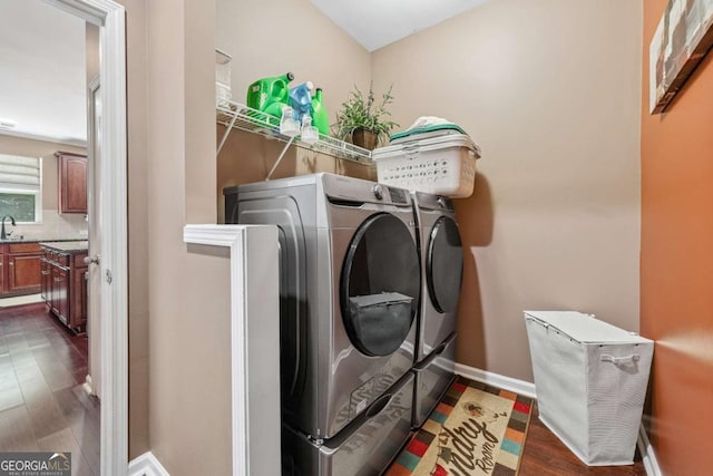 1146 Simonton Peak Way, Lawrenceville, GA 30045 - laundry area featuring independent washer and dryer and dark wood-style flooring