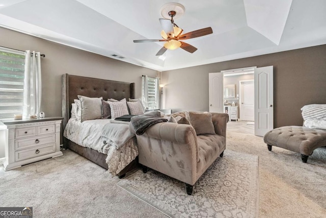 1146 Simonton Peak Way, Lawrenceville, GA 30045 - bedroom featuring light carpet, multiple windows, and a raised ceiling