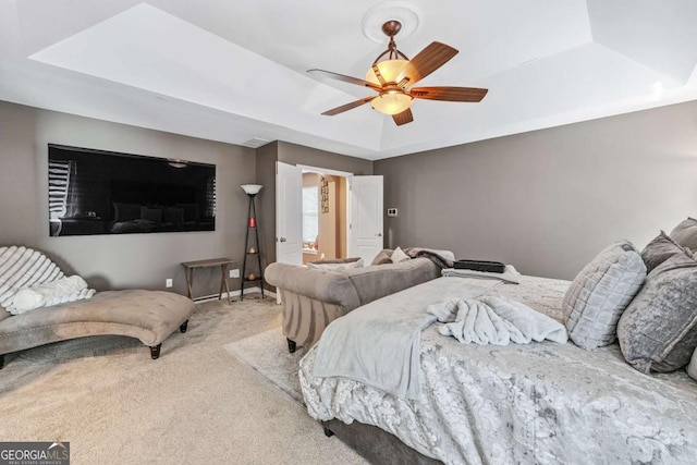1146 Simonton Peak Way, Lawrenceville, GA 30045 - carpeted bedroom with a raised ceiling and a ceiling fan
