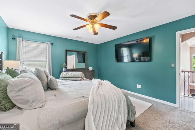 1146 Simonton Peak Way, Lawrenceville, GA 30045 - carpeted bedroom featuring baseboards and a ceiling fan