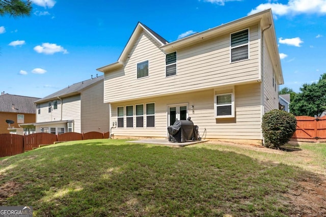 1146 Simonton Peak Way, Lawrenceville, GA 30045 - back of property featuring a fenced backyard and a patio area