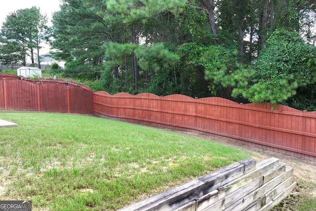 1146 Simonton Peak Way, Lawrenceville, GA 30045 - fenced backyard featuring a shed