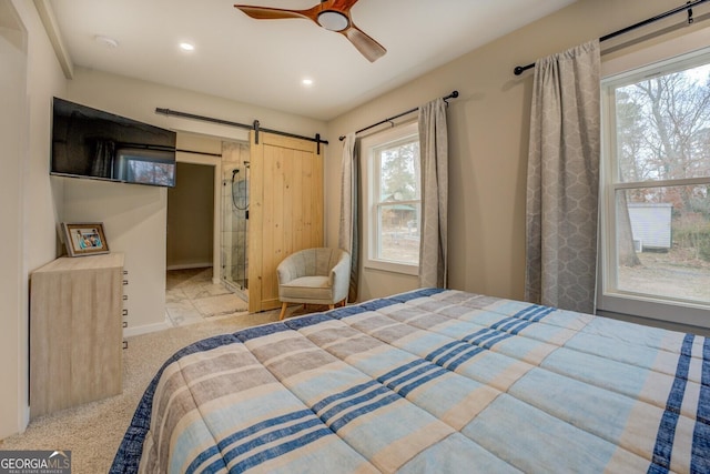 480 Mitchell Rd, Covington, GA 30014 - carpeted bedroom with a barn door, recessed lighting, and ceiling fan