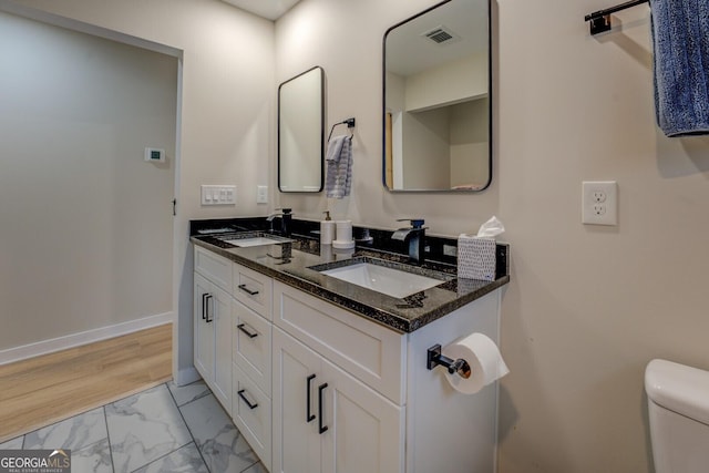 480 Mitchell Rd, Covington, GA 30014 - bathroom with double vanity and marble finish flooring