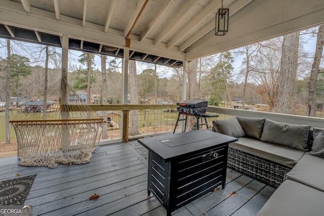 480 Mitchell Rd, Covington, GA 30014 - deck featuring outdoor lounge area and view of scattered trees
