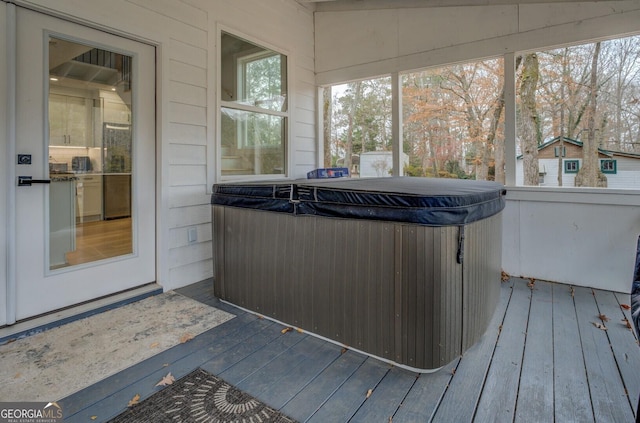 480 Mitchell Rd, Covington, GA 30014 - sunroom with a jacuzzi and plenty of natural light