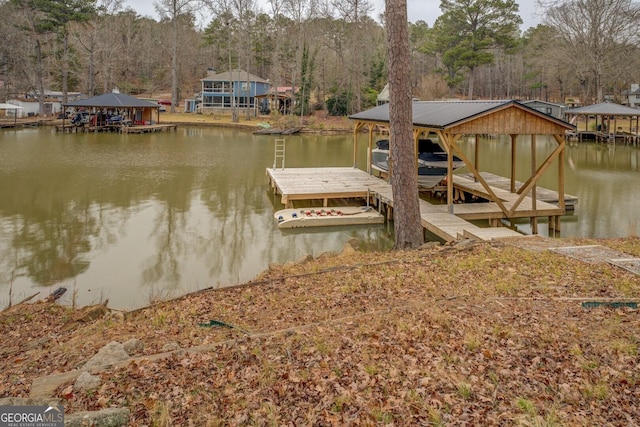 480 Mitchell Rd, Covington, GA 30014 - dock area featuring a water view, boat lift, and a forest view