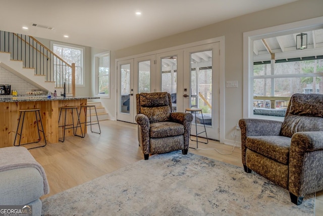 480 Mitchell Rd, Covington, GA 30014 - living area with french doors, stairs, light wood-type flooring, and recessed lighting