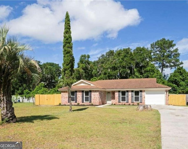 107 Runaway Point Rd, Savannah, GA 31404 - view of front of property with driveway, a garage, and brick siding