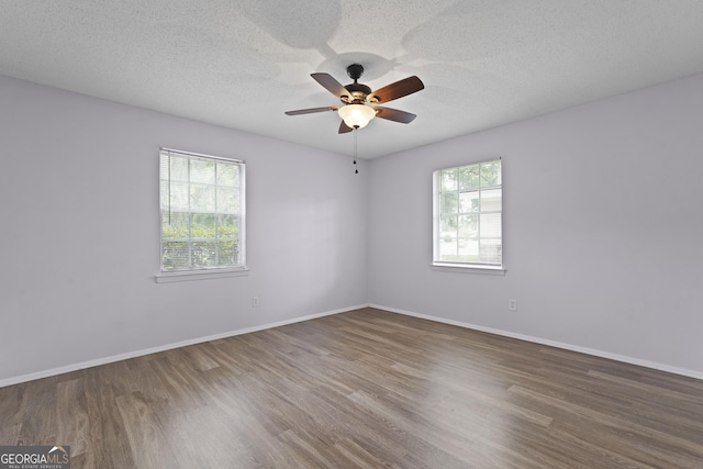 631 Valleybrook Rd, Savannah, GA 31419 - unfurnished room with wood finished floors, a ceiling fan, and a textured ceiling