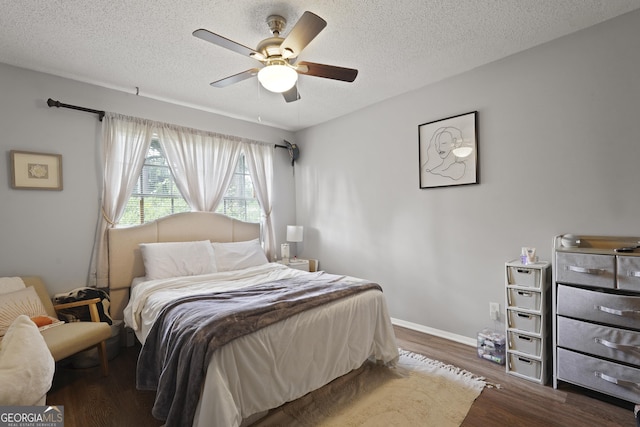 631 Valleybrook Rd, Savannah, GA 31419 - bedroom with wood finished floors, a textured ceiling, and a ceiling fan