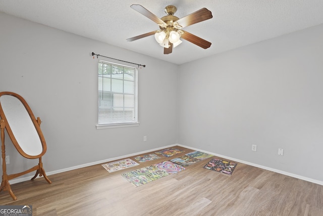 631 Valleybrook Rd, Savannah, GA 31419 - unfurnished room with wood finished floors, ceiling fan, and a textured ceiling