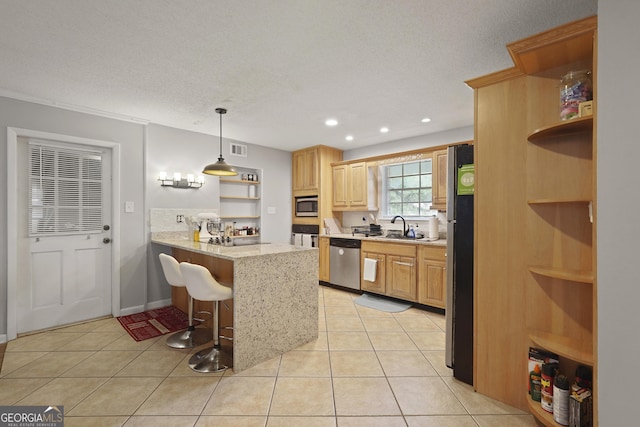 631 Valleybrook Rd, Savannah, GA 31419 - kitchen featuring open shelves, appliances with stainless steel finishes, a peninsula, recessed lighting, and light stone countertops