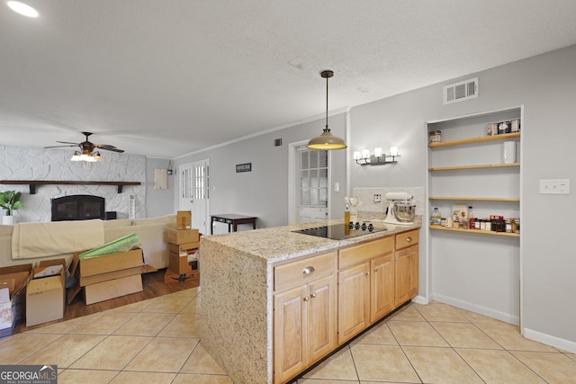 631 Valleybrook Rd, Savannah, GA 31419 - kitchen with black electric stovetop, light tile patterned flooring, ceiling fan, a peninsula, and light stone countertops