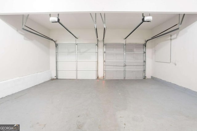 6207 Idlewood Cir, Lithonia, GA 30038 - garage featuring a garage door opener