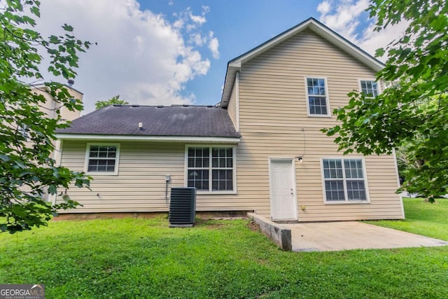 6207 Idlewood Cir, Lithonia, GA 30038 - back of house featuring a patio and a lawn