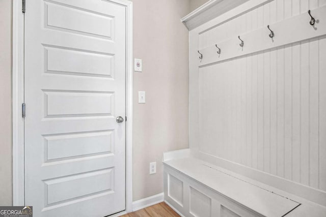 1049 Bodega Loop, Locust Grove, GA 30248 - mudroom featuring light wood-style flooring and baseboards