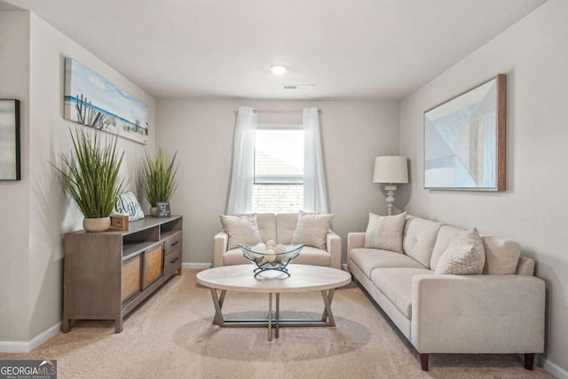 1049 Bodega Loop, Locust Grove, GA 30248 - living area with baseboards and light carpet
