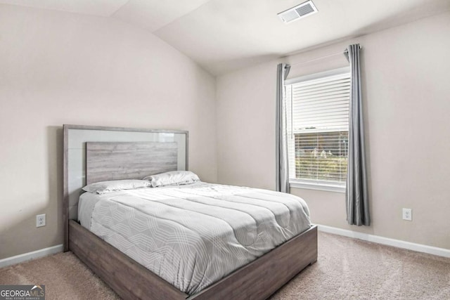1049 Bodega Loop, Locust Grove, GA 30248 - carpeted bedroom featuring vaulted ceiling and baseboards
