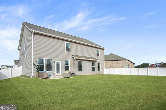1049 Bodega Loop, Locust Grove, GA 30248 - back of house featuring a fenced backyard and a patio