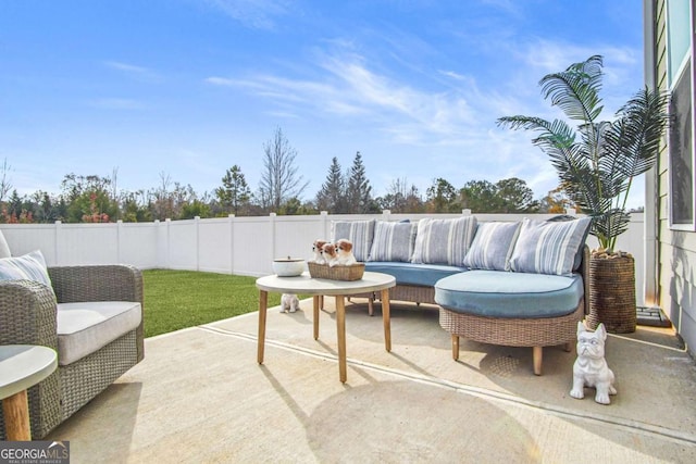 1049 Bodega Loop, Locust Grove, GA 30248 - fenced backyard featuring a patio area and an outdoor living space