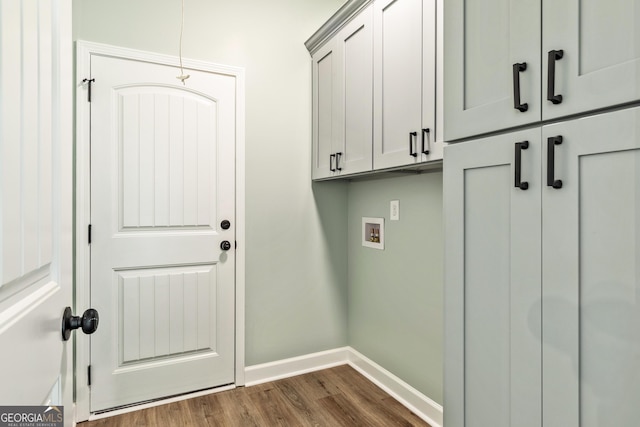148 David Elder Rd, Griffin, GA 30223 - laundry room featuring cabinet space, washer hookup, and dark wood-type flooring