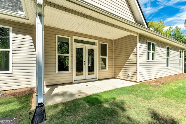 148 David Elder Rd, Griffin, GA 30223 - doorway to property featuring a yard, a patio, and french doors