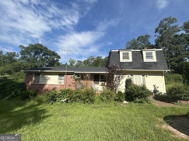 1551 Vaughn Rd, Griffin, GA 30223 - view of front of house with roof with shingles, brick siding, and a chimney