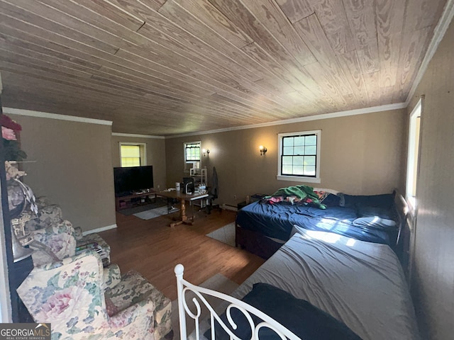1551 Vaughn Rd, Griffin, GA 30223 - living room featuring wooden ceiling, wood finished floors, ornamental molding, and baseboard heating