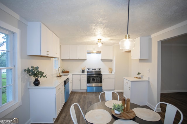 235 Cindy St, Jackson, GA 30233 - kitchen featuring electric stove, dishwasher, dark wood-style floors, light countertops, and white cabinetry