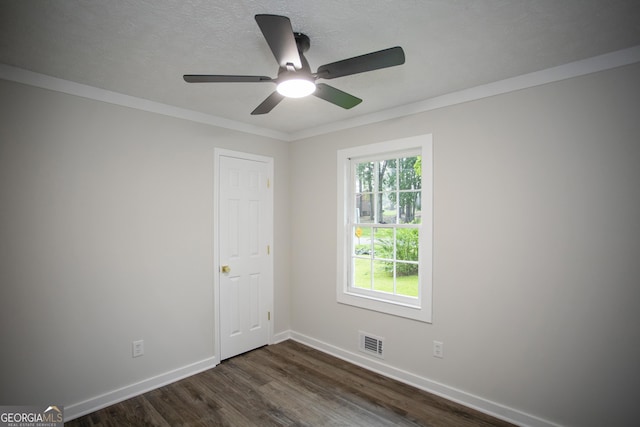 235 Cindy St, Jackson, GA 30233 - empty room with dark wood-type flooring, ceiling fan, and ornamental molding